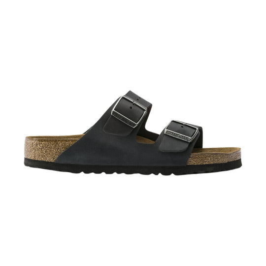 Black two-strap sandal with cork footbed and adjustable metal buckles