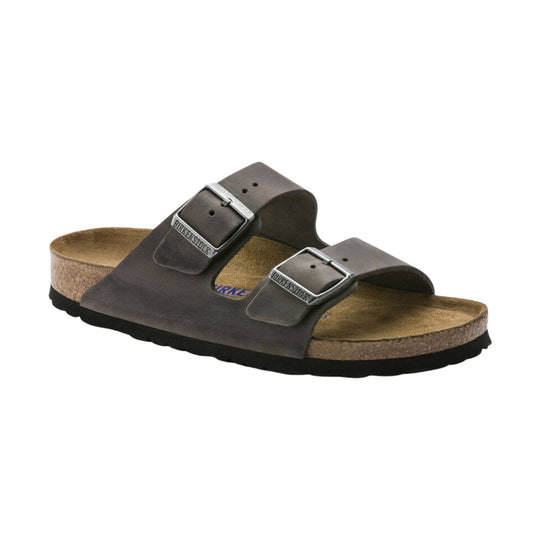 Dark brown two-strap cork footbed sandal with silver buckles