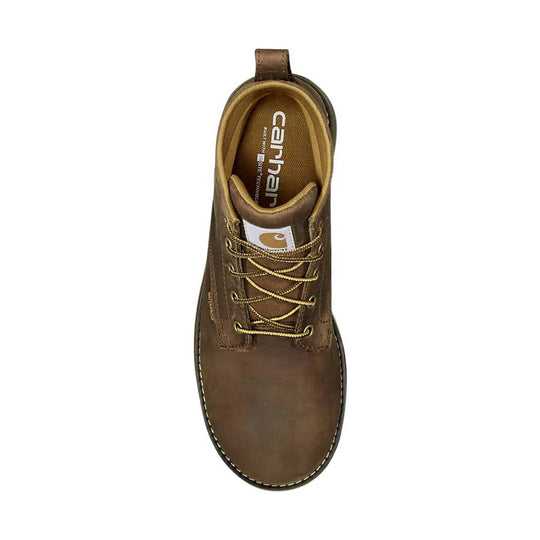 Brown leather lace-up work boot seen from above, with padded collar and pull tab