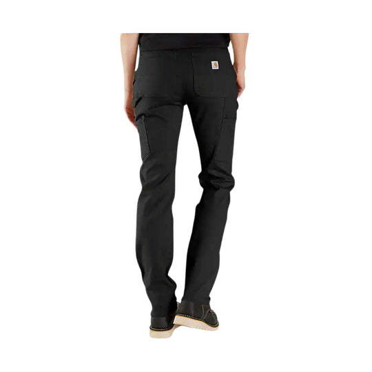 Black women’s work pants with cargo pockets and a small Carhartt patch on the back pocket, shown from behind.