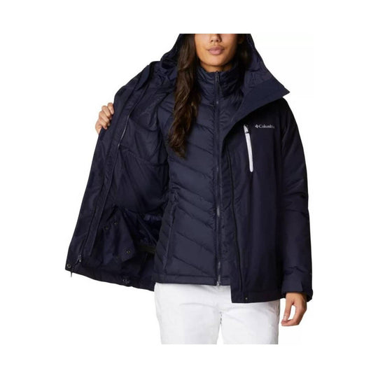 Navy hooded women’s insulated jacket with a zip-front shell and inner puffer layer shown open