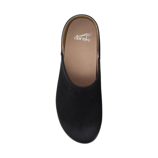 Black closed-toe clog with tan insole, shown from above