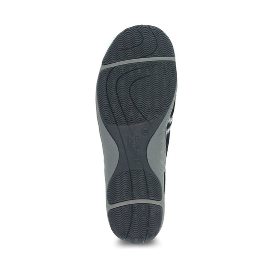 Black and gray shoe sole with wavy tread pattern and size 38 marking