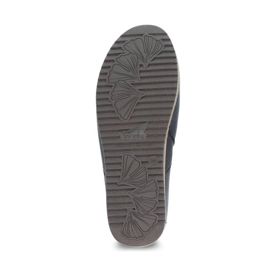 Dark gray outsole with ribbed tread and floral leaf patterns, showing Dansko branding