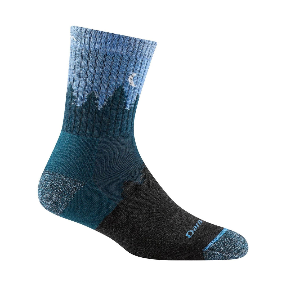 Blue and black mid-calf hiking sock with a forest-and-moon pattern