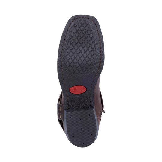 Boot sole view with dark tread and a red oval logo near the heel