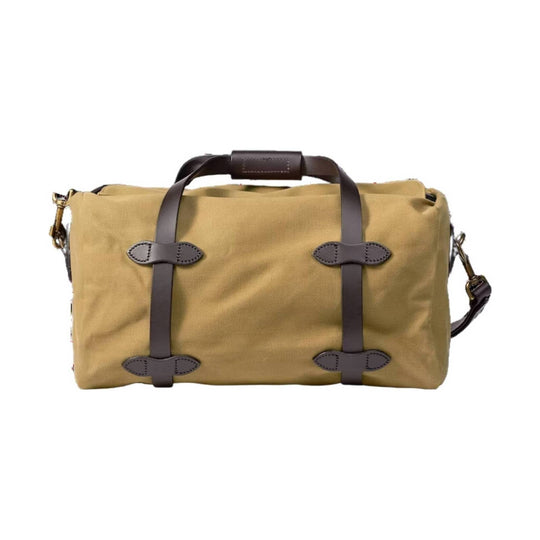 Tan canvas duffel bag with dark brown leather handles and front buckle straps