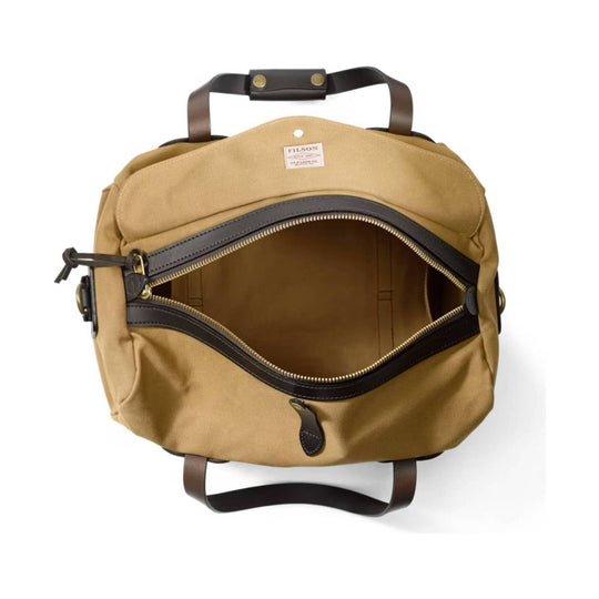 Tan canvas duffel bag with dark brown leather handles and trim, shown open