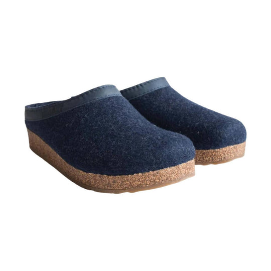 Pair of navy felt clogs with cork wedge soles on a white background