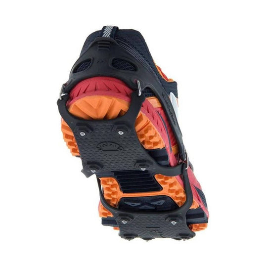 Trail traction cleat with a black rubber frame, metal chains, and orange coiled grips