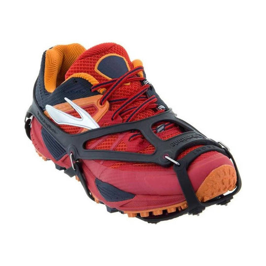 Red trail-running shoe with a black traction cage, orange accents, and visible "NANOspikes" text