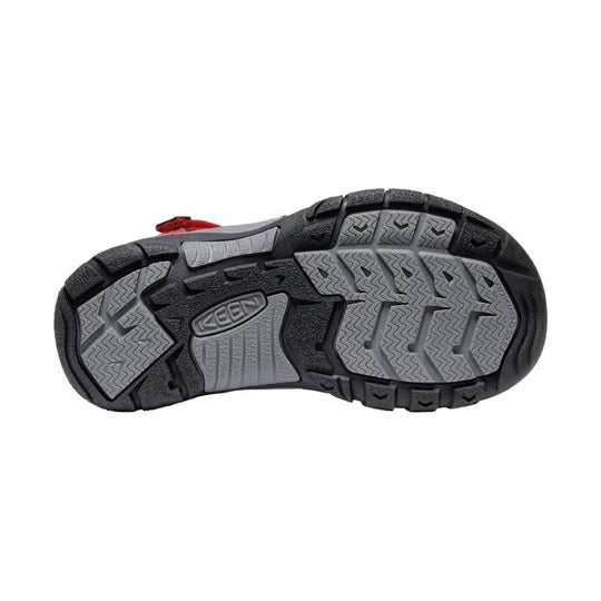Black and gray rugged sandal outsole with KEEN logo and red strap visible