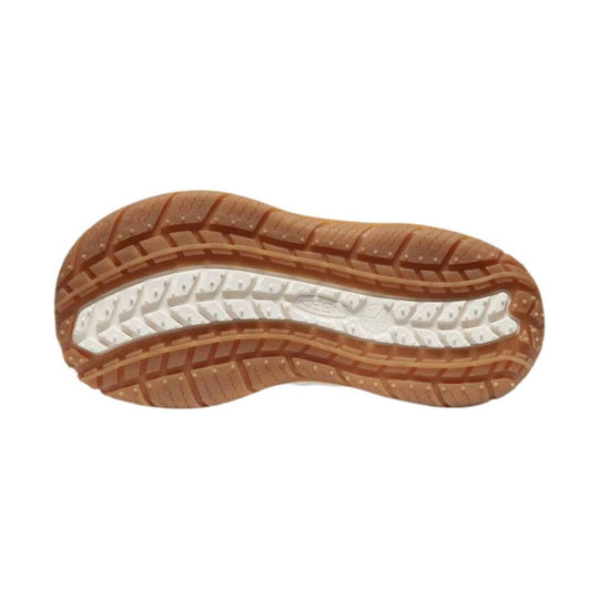 Brown and white shoe outsole with rugged tread pattern