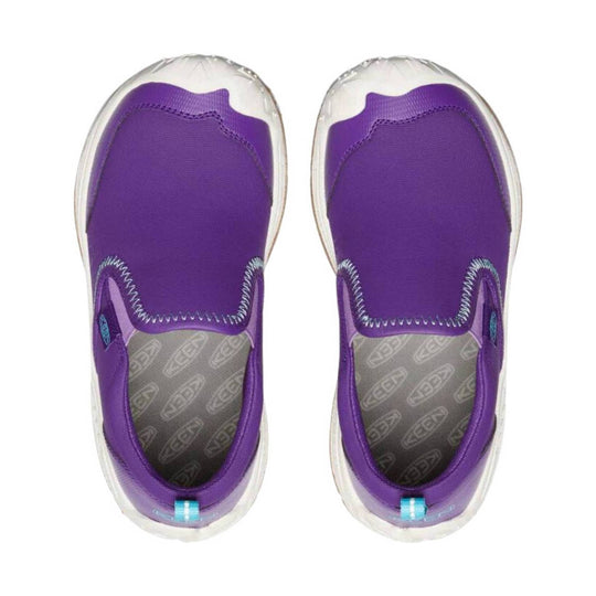 Purple kids slip-on shoe with a clear protective toe cap and gray patterned insole, top view