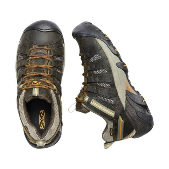 Olive and black hiking shoes with orange laces, side mesh panels, and rugged soles