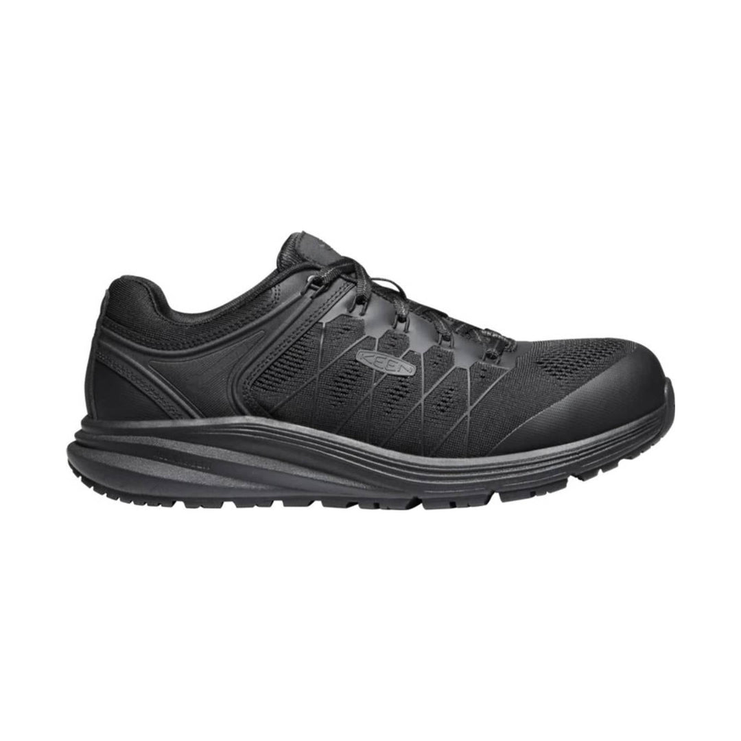 Black low-top work shoe with a mesh upper, lace-up closure, and rugged treaded sole