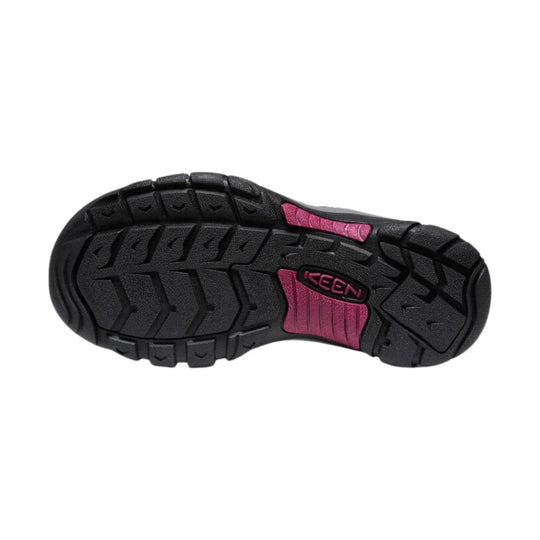 Black rugged shoe outsole with pink accents and KEEN logo