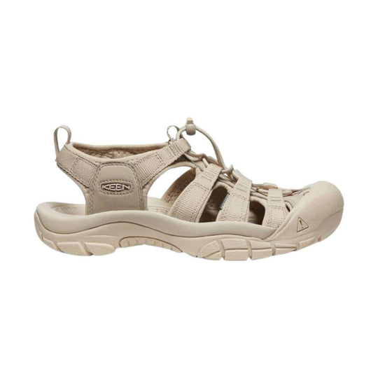 Beige closed-toe hiking sandal with bungee laces, side cutouts, and a cushioned sole