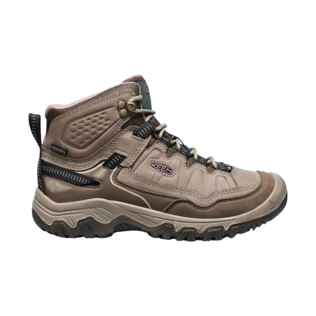 Mid-height brown hiking boot with beige panels, black laces, and a rugged lug sole