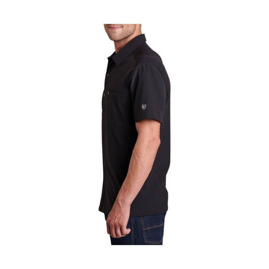 Black short-sleeve button-up shirt shown in side view with a pointed collar and chest pocket