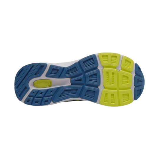 Blue and neon yellow sneaker sole with segmented tread pattern