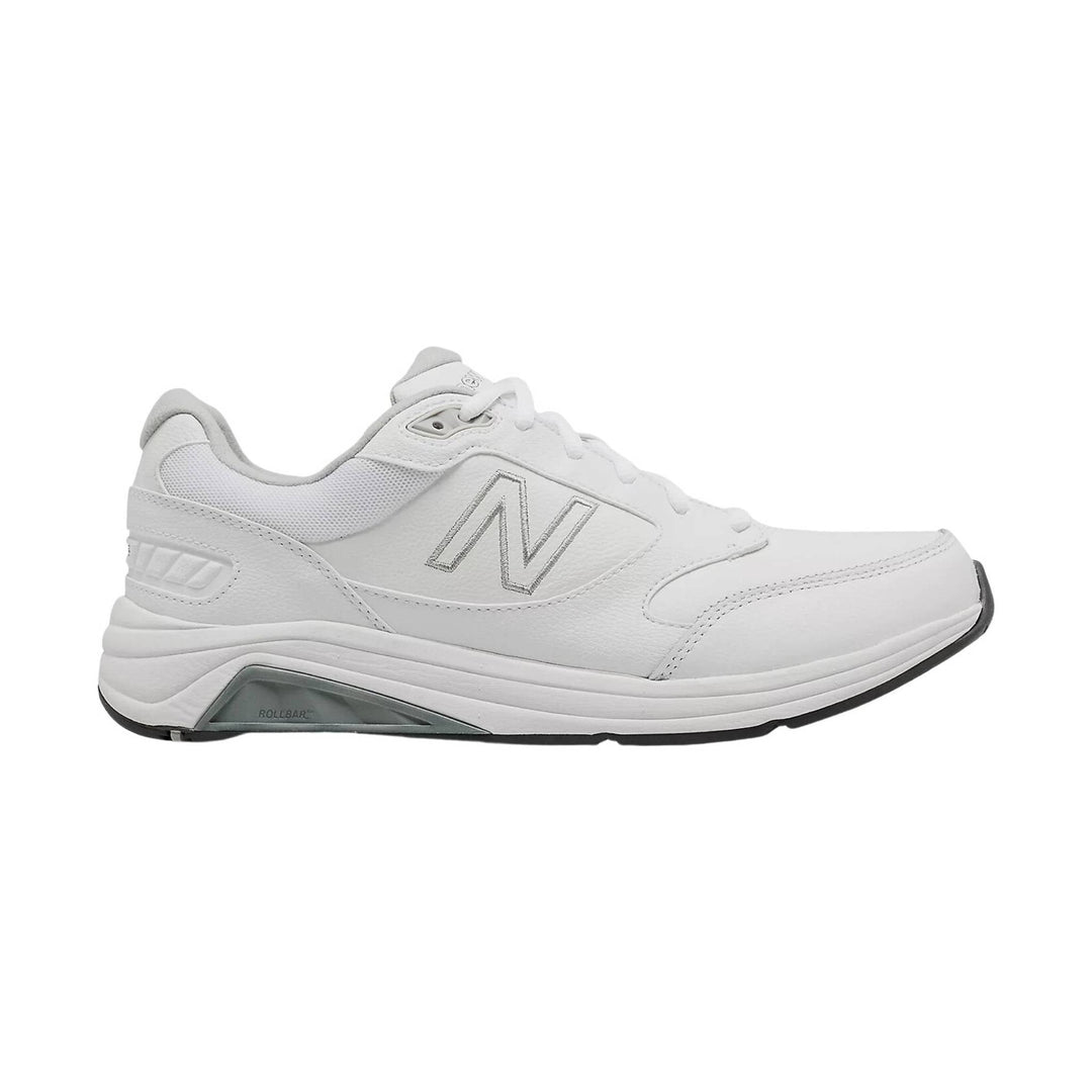 White leather walking shoe with mesh panels, lace-up closure, and gray sole insert