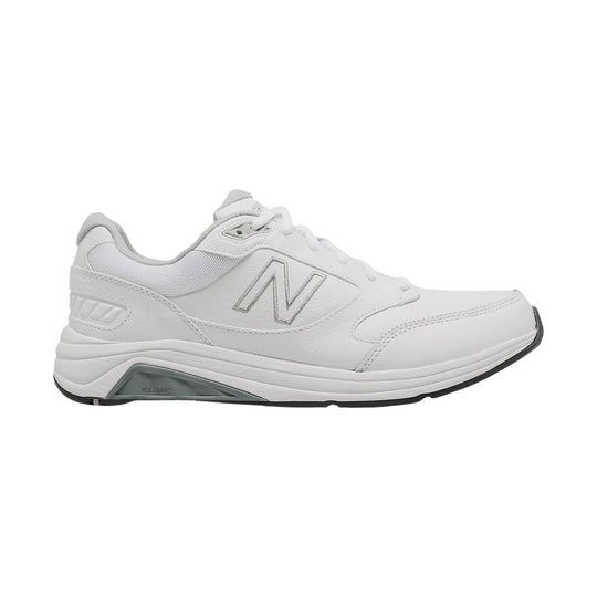 White leather walking shoe with mesh panels, lace-up closure, and gray sole insert