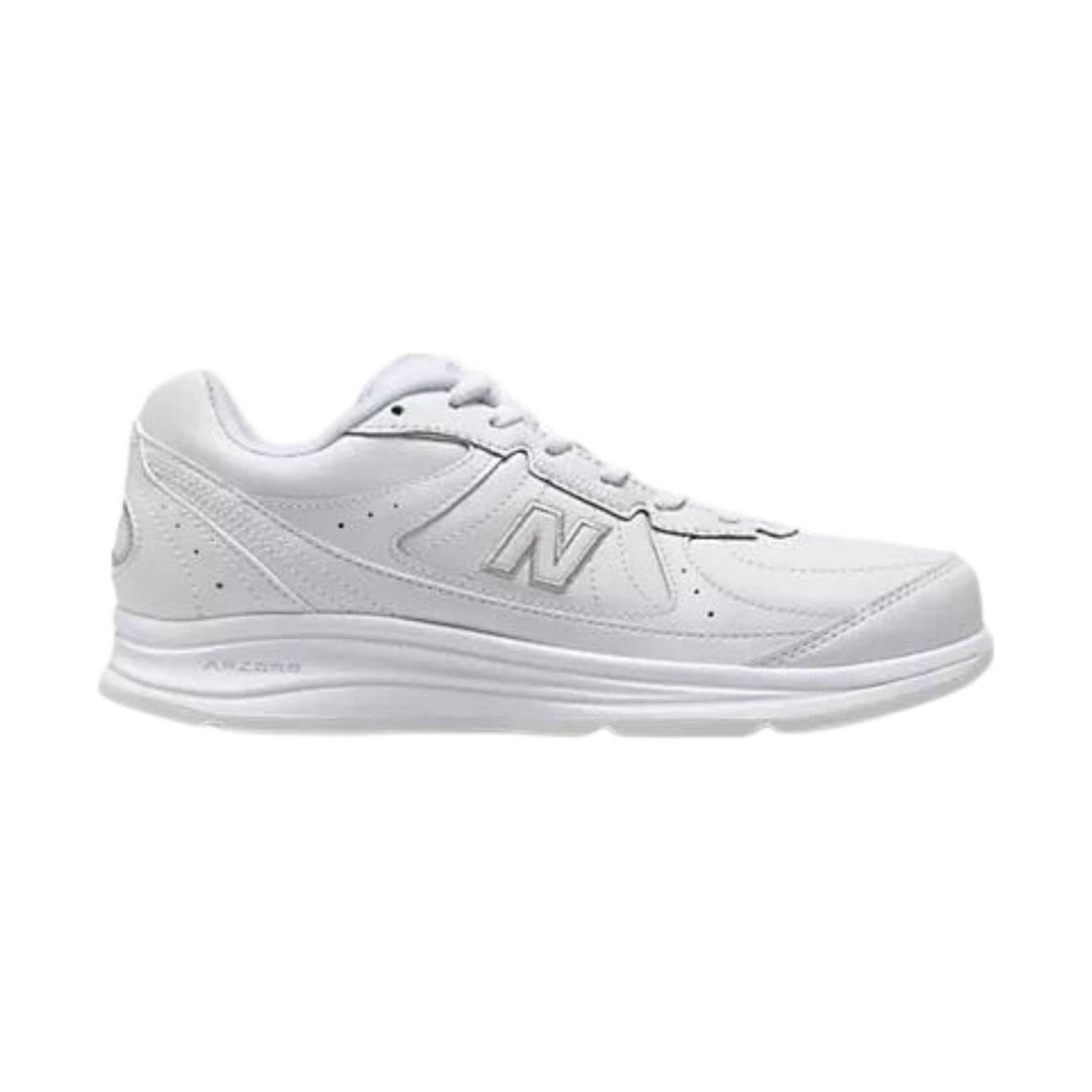 White low-top athletic sneaker with laces, side logo, and thick cushioned sole
