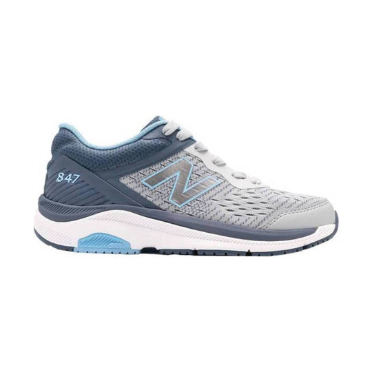 Gray and blue athletic walking shoe with white laces and a cushioned sole, shown in side profile