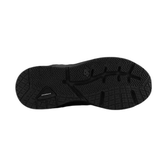 Black shoe outsole with chevron and grid tread pattern