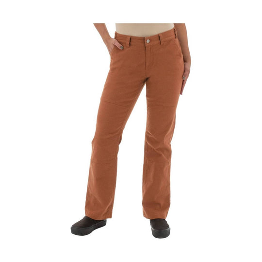 Rust-colored straight-leg pants with front seam details and black slip-on shoes