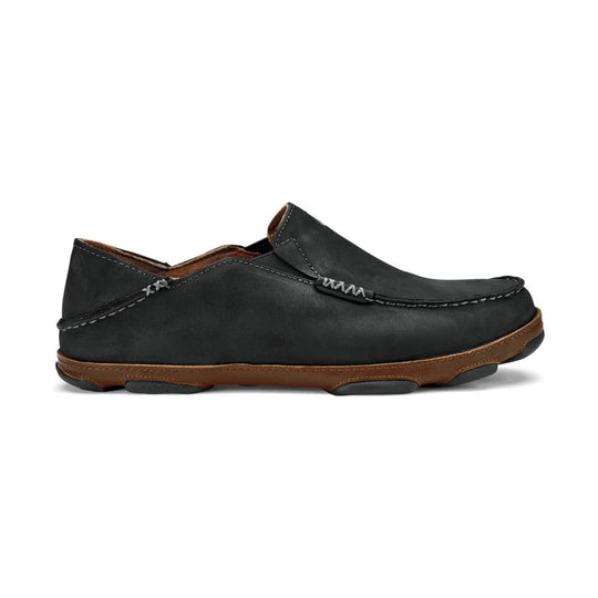 Black slip-on moccasin with brown sole and contrast stitching
