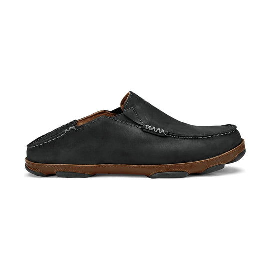 Black slip-on moc toe shoe with brown sole and contrast stitching