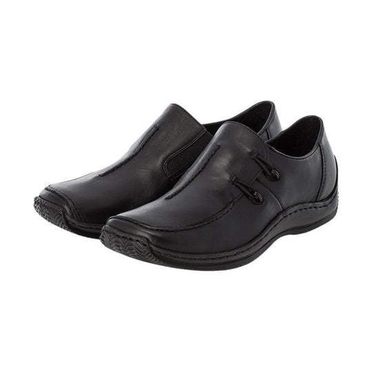 Black slip-on dress shoes with stitched uppers and textured soles
