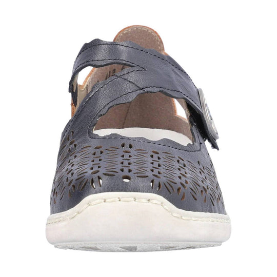 Gray leather sandal with cutout floral pattern, crossover straps, and a white sole, front view