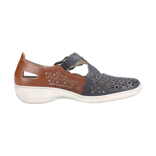 Brown and navy closed-toe sandal with floral cutouts and a white wedge sole