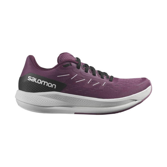 Purple running shoe with black heel panel, white midsole, and side logo text