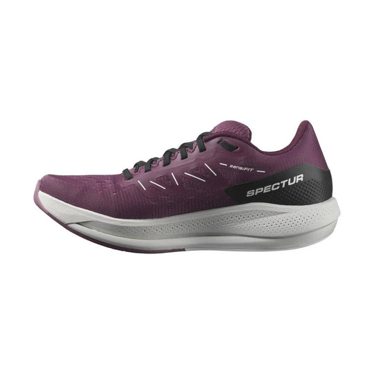 Purple running shoe with white midsole, black heel panel, and visible side text