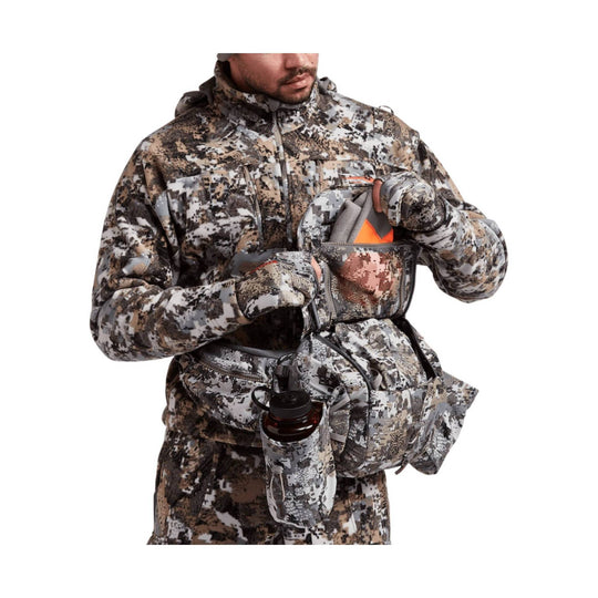 Camouflage hunting belt pack with multiple zip pockets, bottle holder, and orange-lined pouch