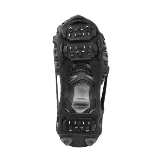 Black traction cleat outsole with metal stud plates and deep tread, viewed from below