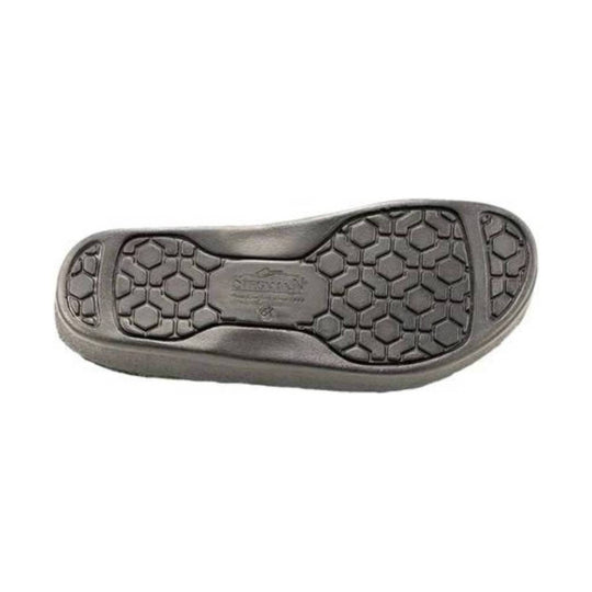 Gray rubber shoe sole with hexagonal tread pattern and faint branding in the center