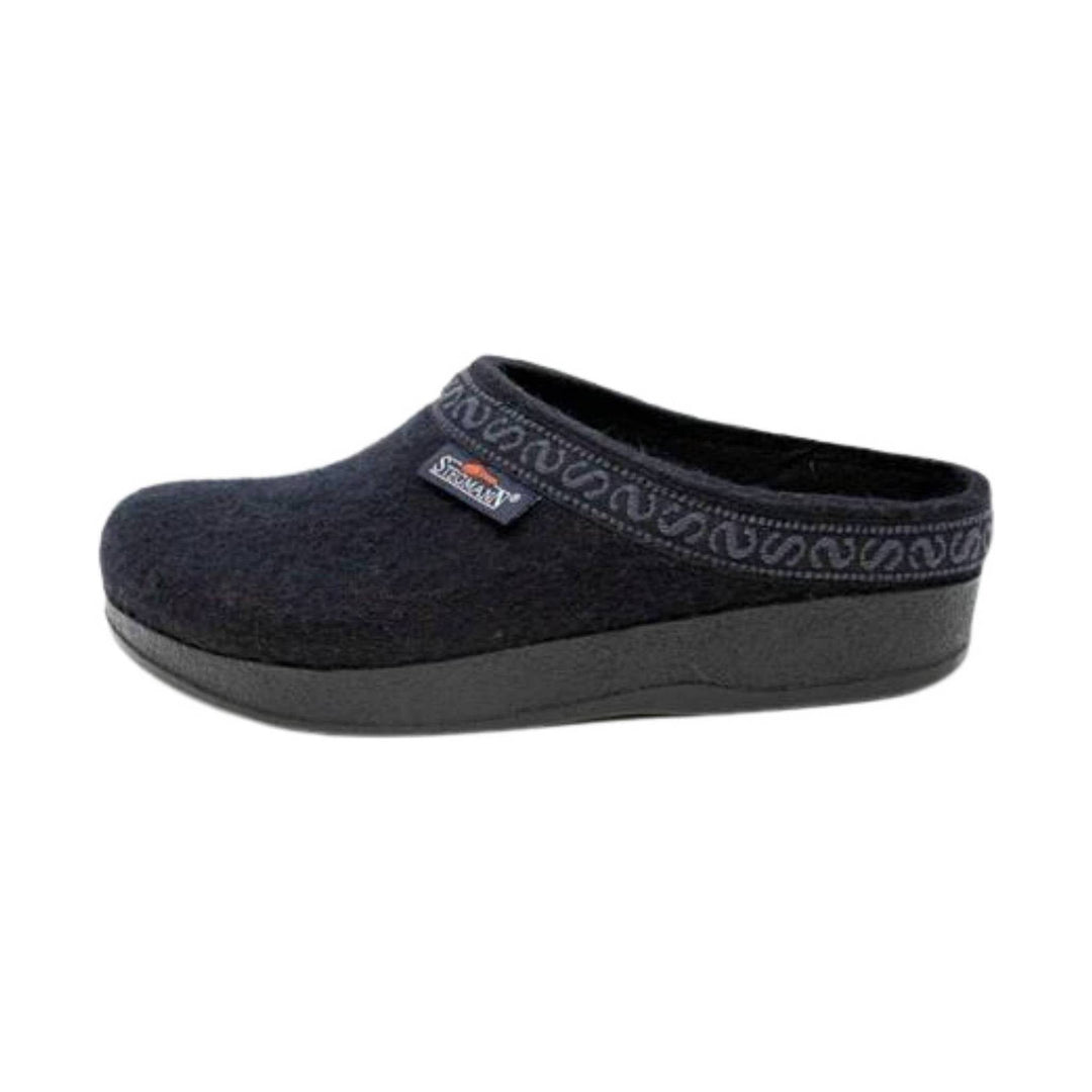 Dark slip-on clog with a thick wedge sole and patterned trim around the collar