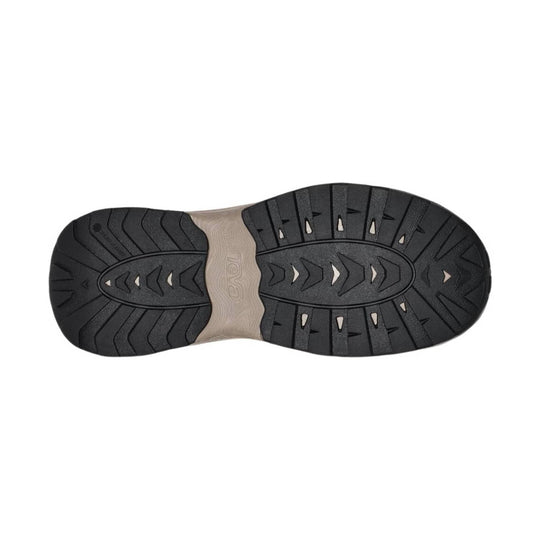 Black and taupe sandal outsole with rugged tread and Teva logo