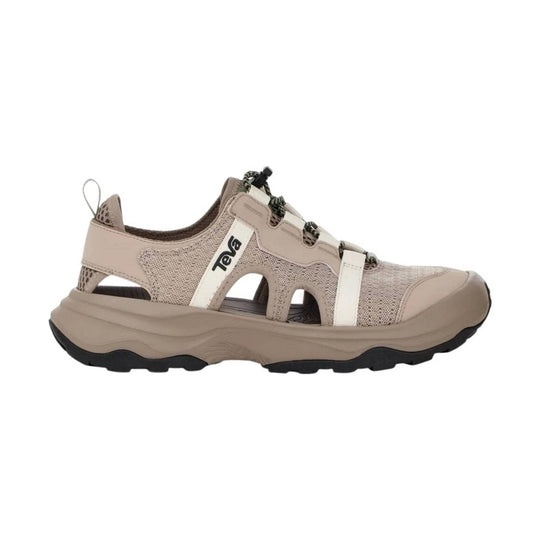 Beige closed-toe hiking sandal with bungee laces, side cutouts, and a thick lug sole