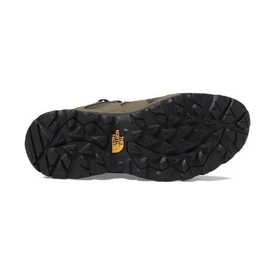 Black lugged hiking shoe outsole with The North Face logo