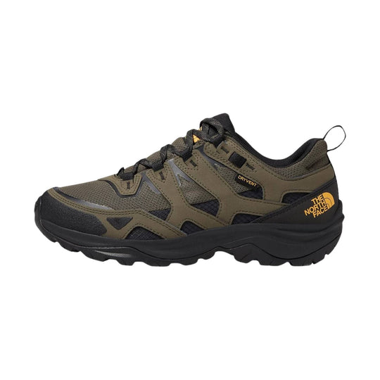 Olive and black hiking shoe with mesh panels, rugged sole, and side logo