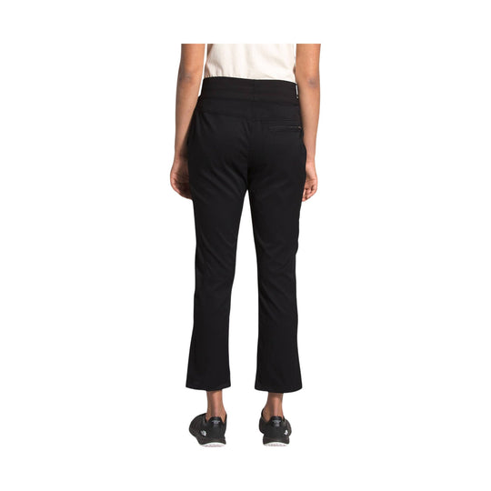 Black cropped athletic pants shown from the back