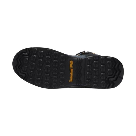 Black lugged boot sole with yellow Timberland PRO logo