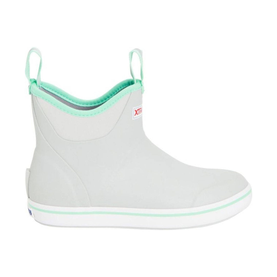 White ankle rain boot with mint trim, pull tabs, and a white rubber sole