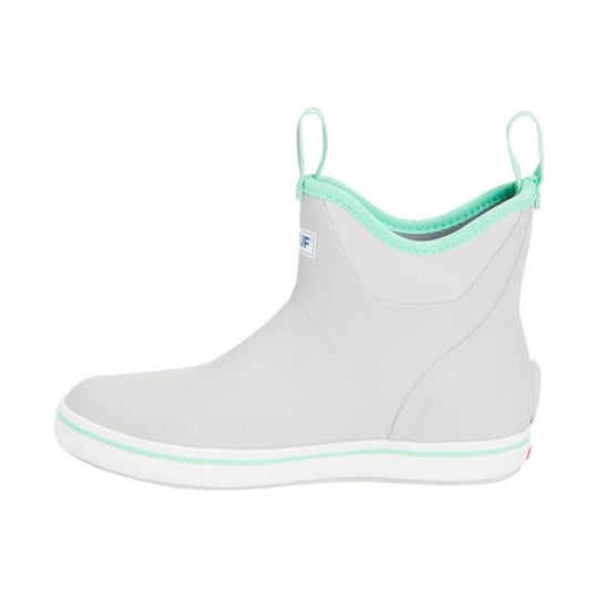 White ankle rain boot with mint green trim and pull tabs